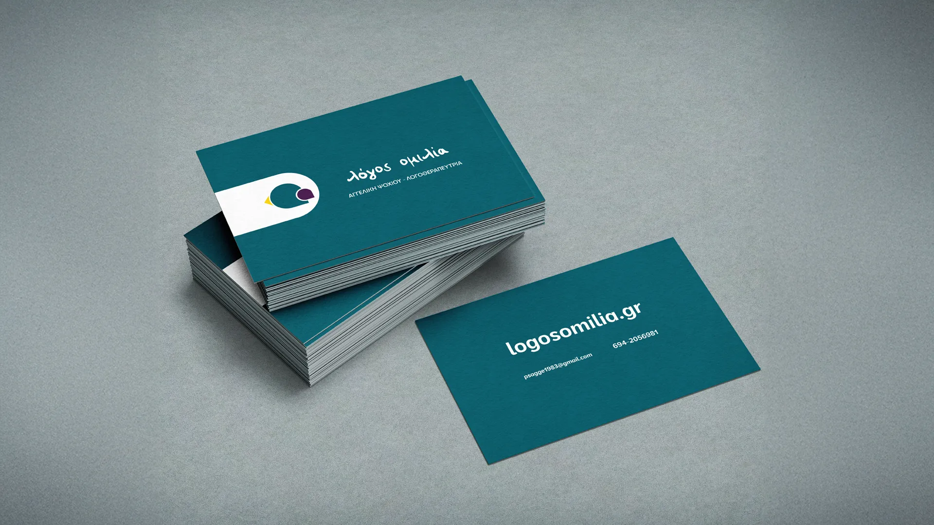 Speech therapist business cards on a table